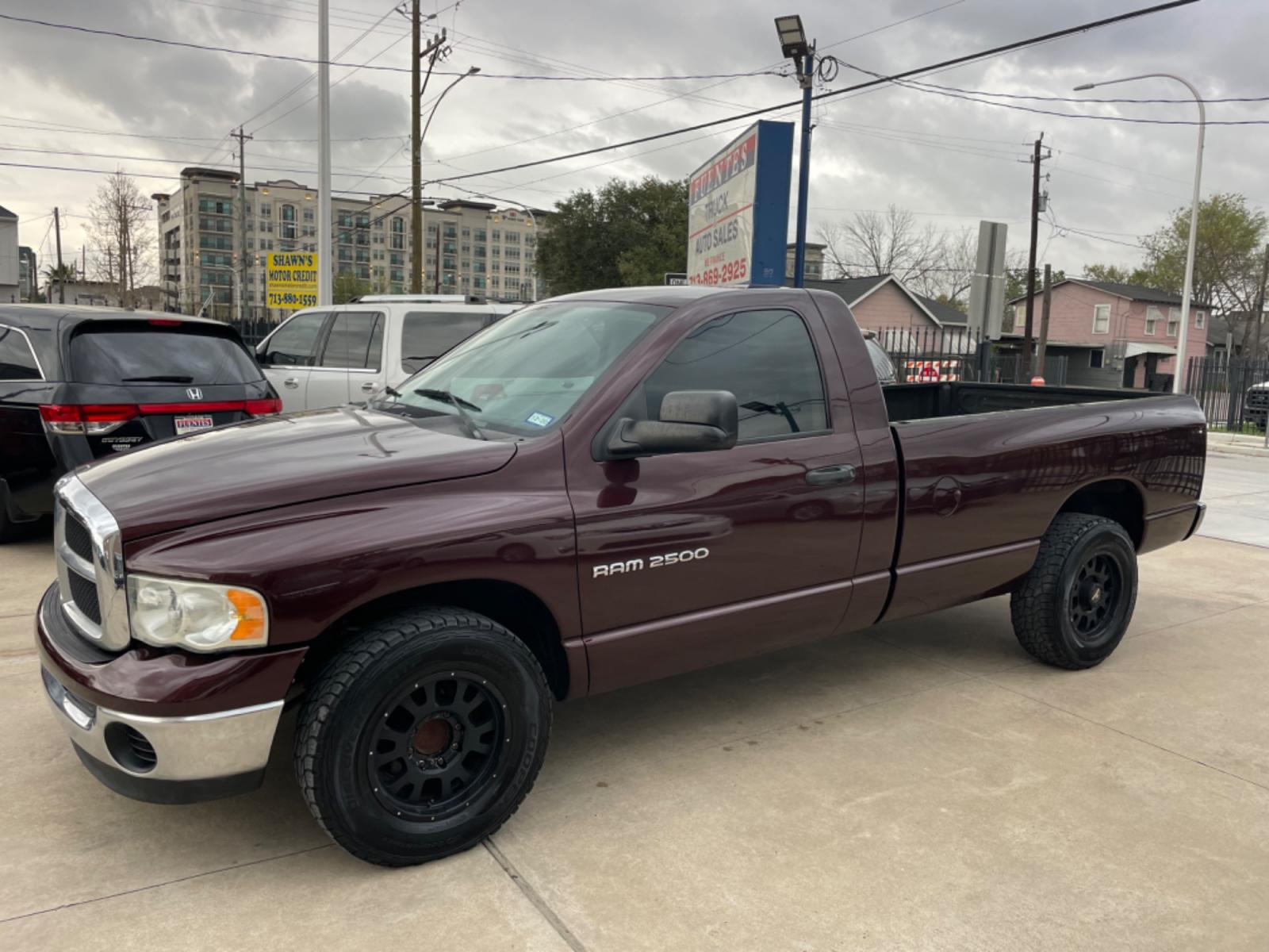 2004 Maroon /Black Dodge Ram 2500 Laramie 2WD (3D7KA26C44G) with an 5.9L L6 OHV 24V TURBO DIESEL engine, Automatic transmission, located at 1501 West 15th St., Houston, 77008, (713) 869-2925, 29.797941, -95.411789 - Photo #0